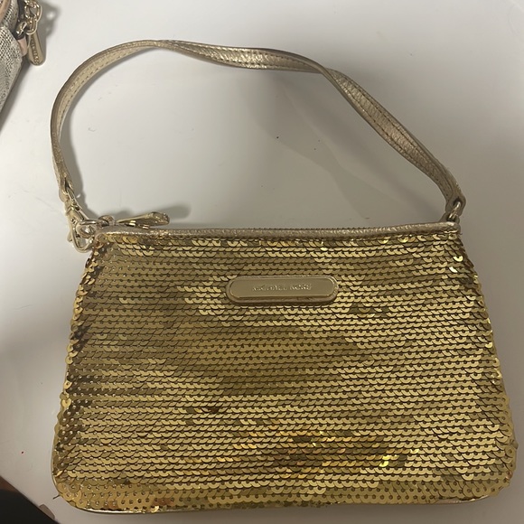 Gold Michael Kor’s wristlet. - Picture 3 of 6